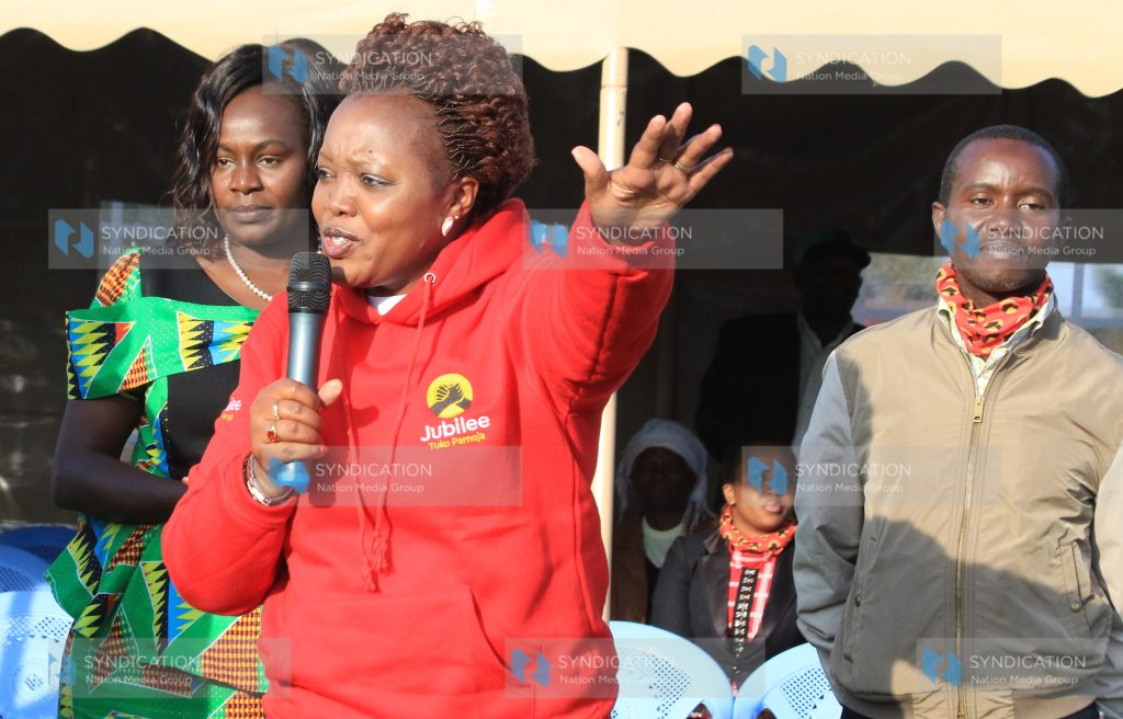 Rahab Mukami, centre, addresses residents of Embaringo village