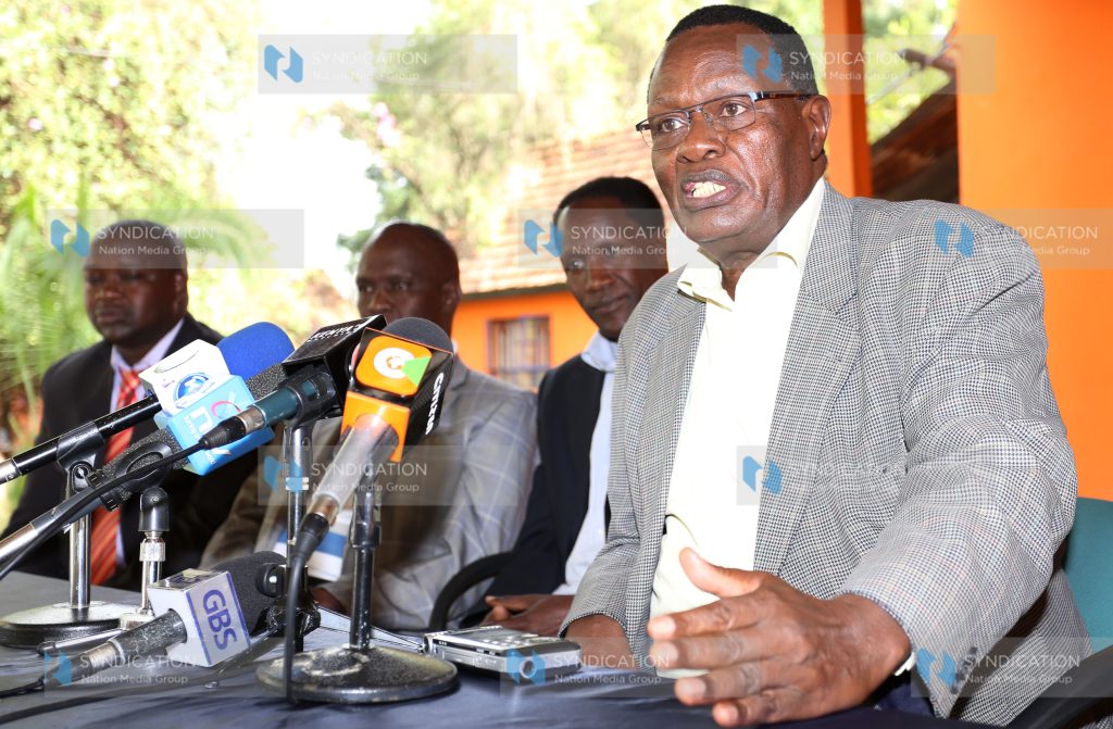 Kisii County Senator Chris Obure addressing the press at Orange House
