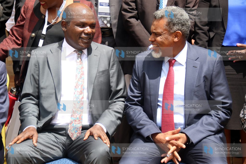 IEBC Chairman Wafula Chebukati chats with DPP Noordin Haji
