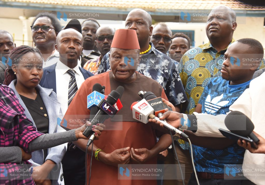 Samwel Moroto MP Kapenguria addresses media outside the Directorate of Criminal Investigations (DCI)
