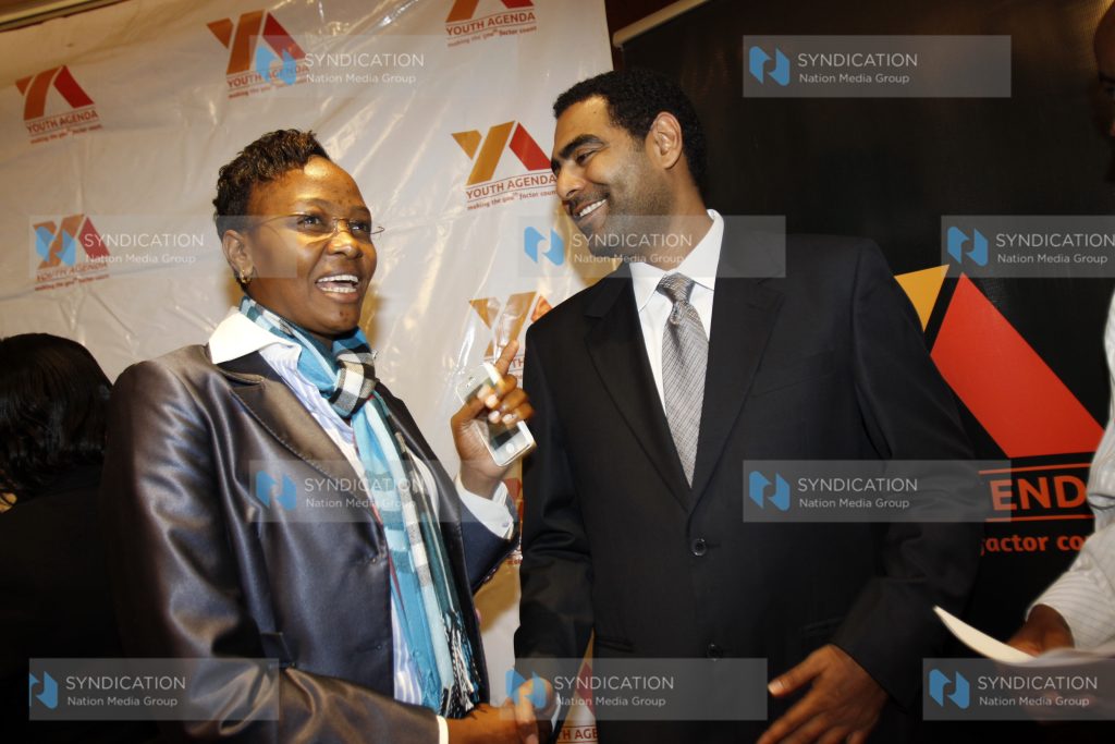 Waithera Chege, the Narc-Kenya National Youth Leader, with Hussein Mohammed, the board chairman of the Youth Agenda