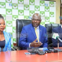 (IEBC) Chairman Wafula Chebukati (center), CEO Ezra Chiloba (right) and Commissioner Roselyne Akombe (left) confer during press conference