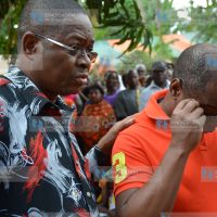 Kilifi Senator Stewart Madzayo (left) consoles Governor Amason Kingi (right) after he broke down in tears as he addressed mourners