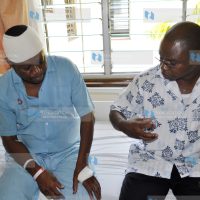 Retired judge Stewart Madzayo visited by the Fisheries Minister Amason Kingi at the Aga Khan Hospital