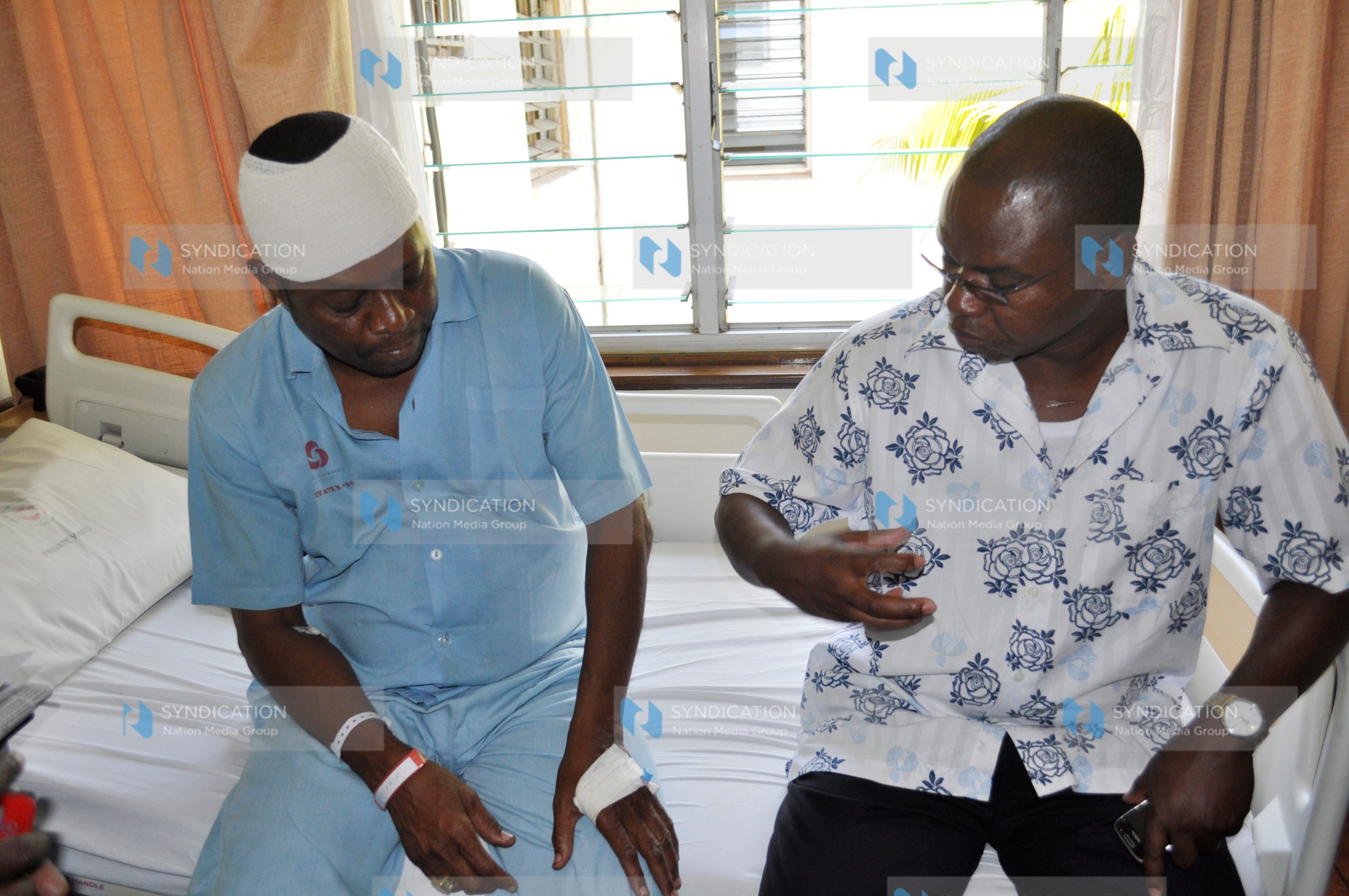 Retired judge Stewart Madzayo visited by the Fisheries Minister Amason Kingi at the Aga Khan Hospital