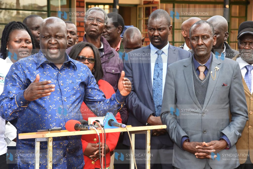 Addressing the press after a meeting at Reformed Church of East Africa