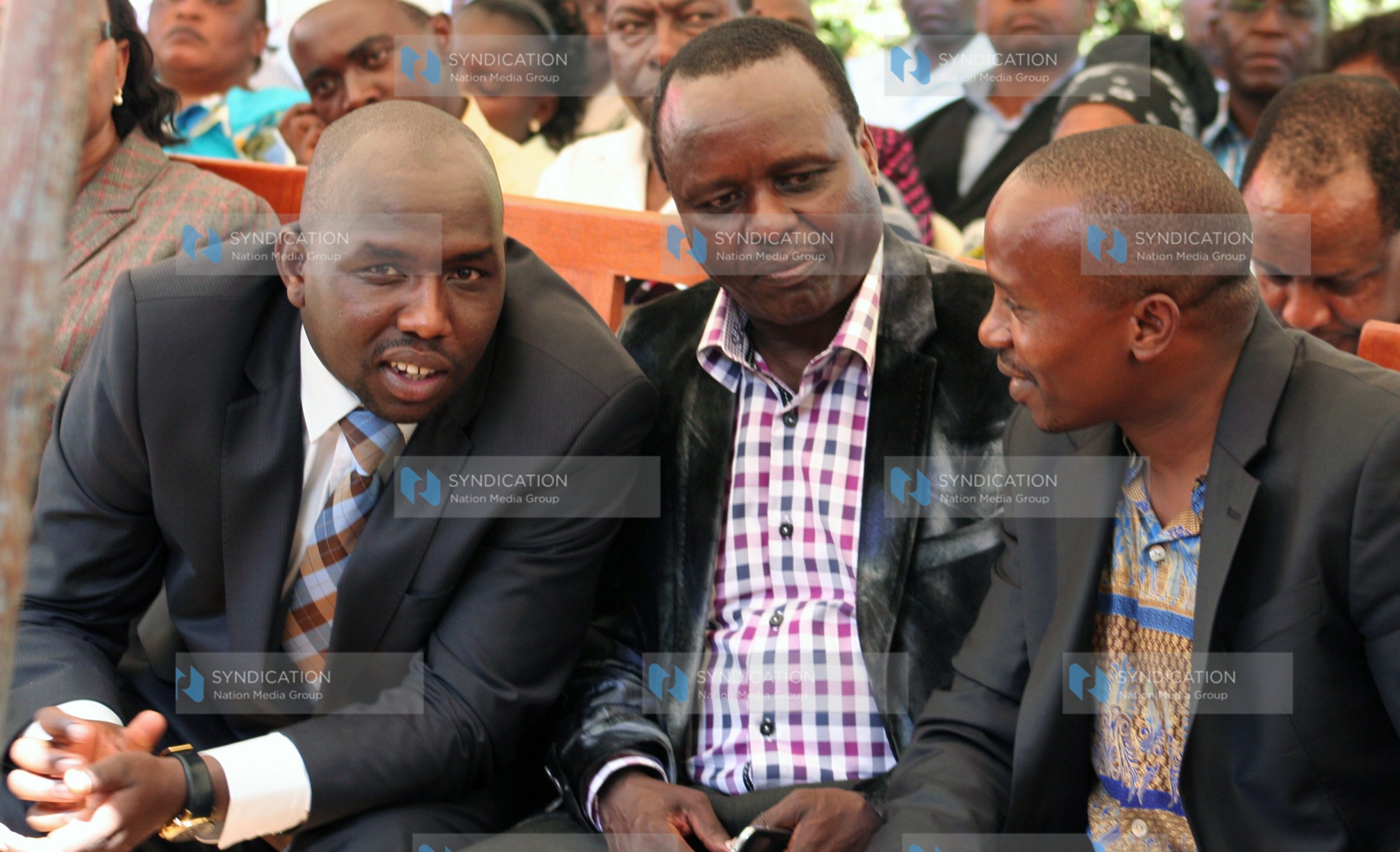 Senators Kipchumba Murkomen, Lenny Kivuti, and Kithure Kindiki chat during the burial of Patrick Munene Mbarire