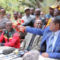 Governor Martin Wambora (right) gestures as former Cooperatives Minister Njeru Ndwiga, Senator Lenny Kivuti, and Deputy Governor Dorothy Nditi look on during a press conference