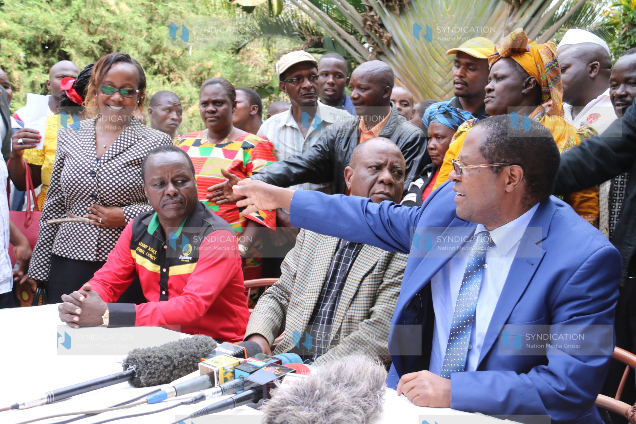 Governor Martin Wambora (right) gestures as former Cooperatives Minister Njeru Ndwiga, Senator Lenny Kivuti, and Deputy Governor Dorothy Nditi look on during a press conference