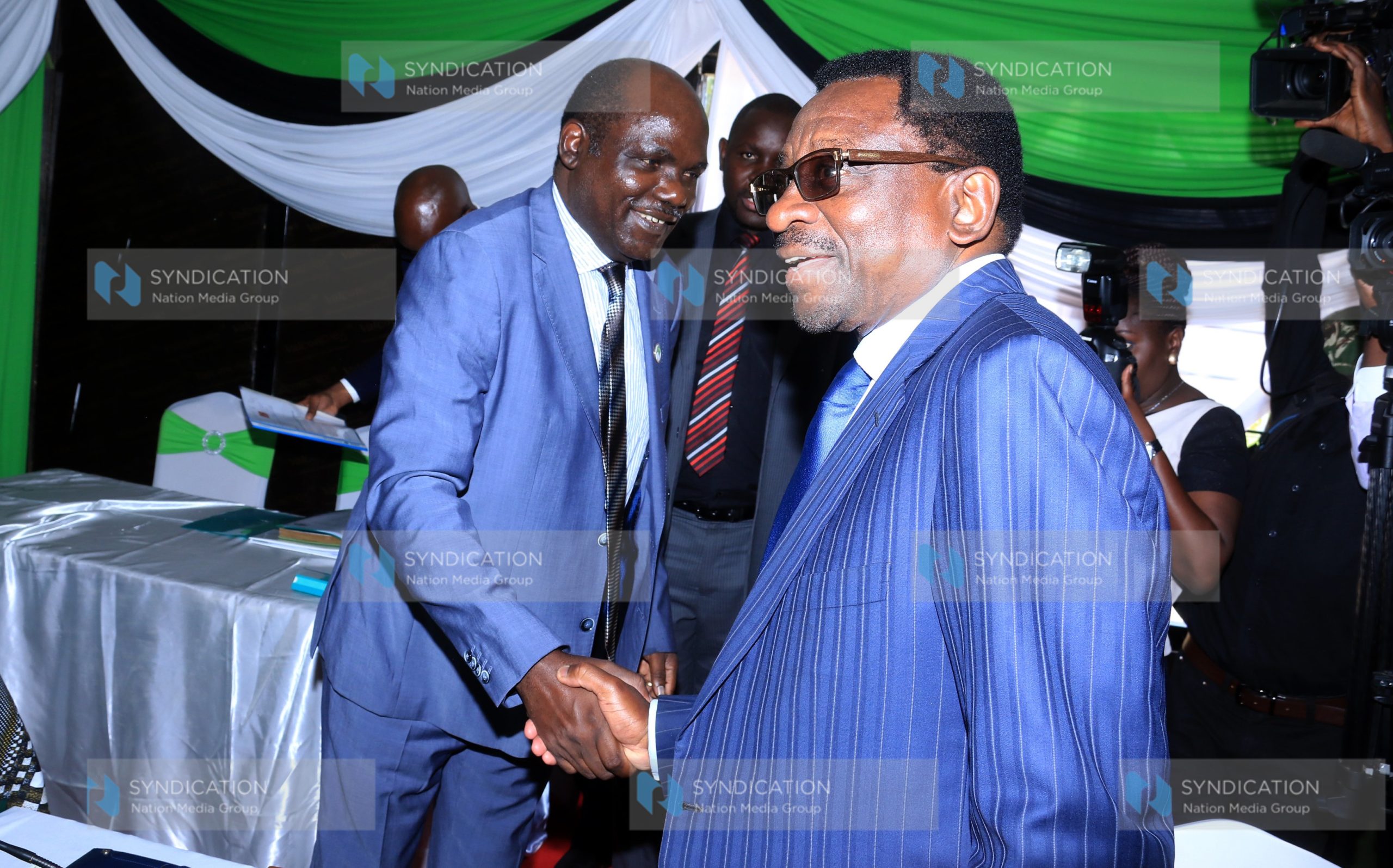 IEBC chairman Wafula Chebukati greets NASA leader James Orengo