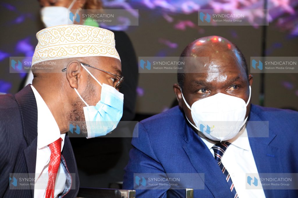 IEBC Chairman Wafula Chebukati having a word with IEBC Ag CEO Marjan Hussein Marjan