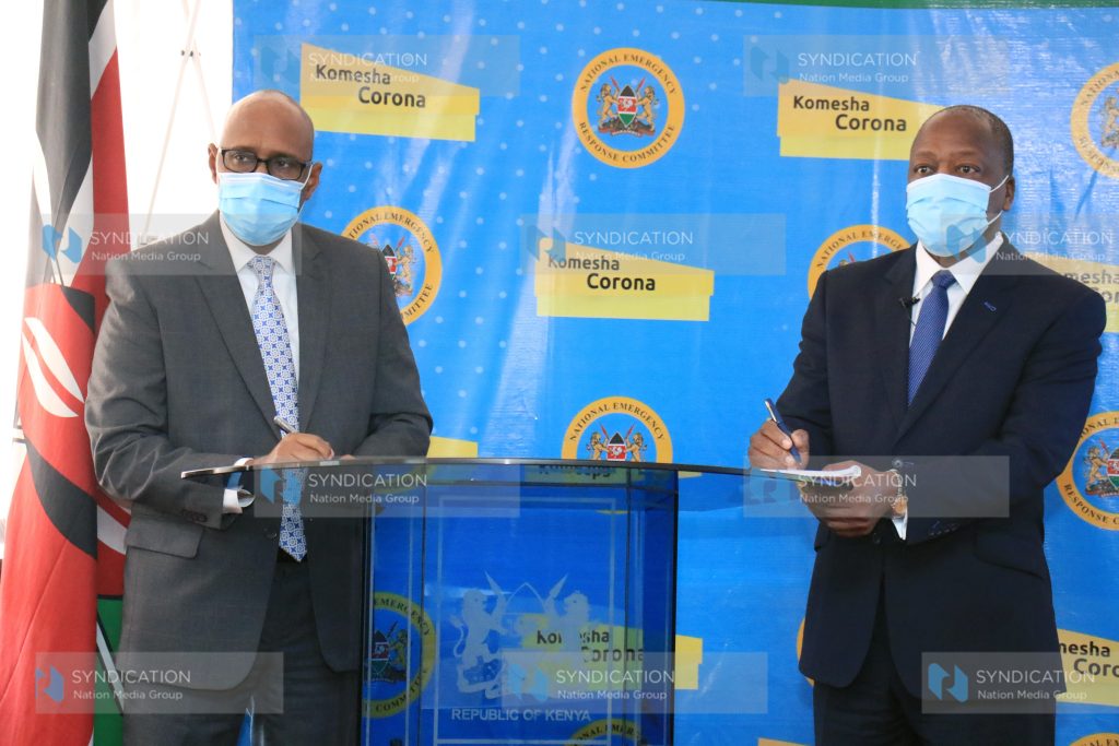 Health Cabinet Secretary Mutahi Kagwe and his EAC and Regional Development CS Adan Mohamed