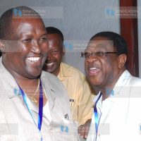 Labour Minister John MUnyes in a jovial mood with AG Amos Wako