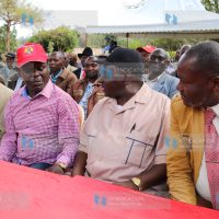 Embu Senator Lenny Kivuti chats with officials