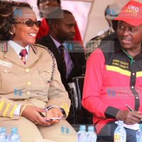 Embu County Commissioner Esther Maina chats with Embu Senator Lenny Kivuti