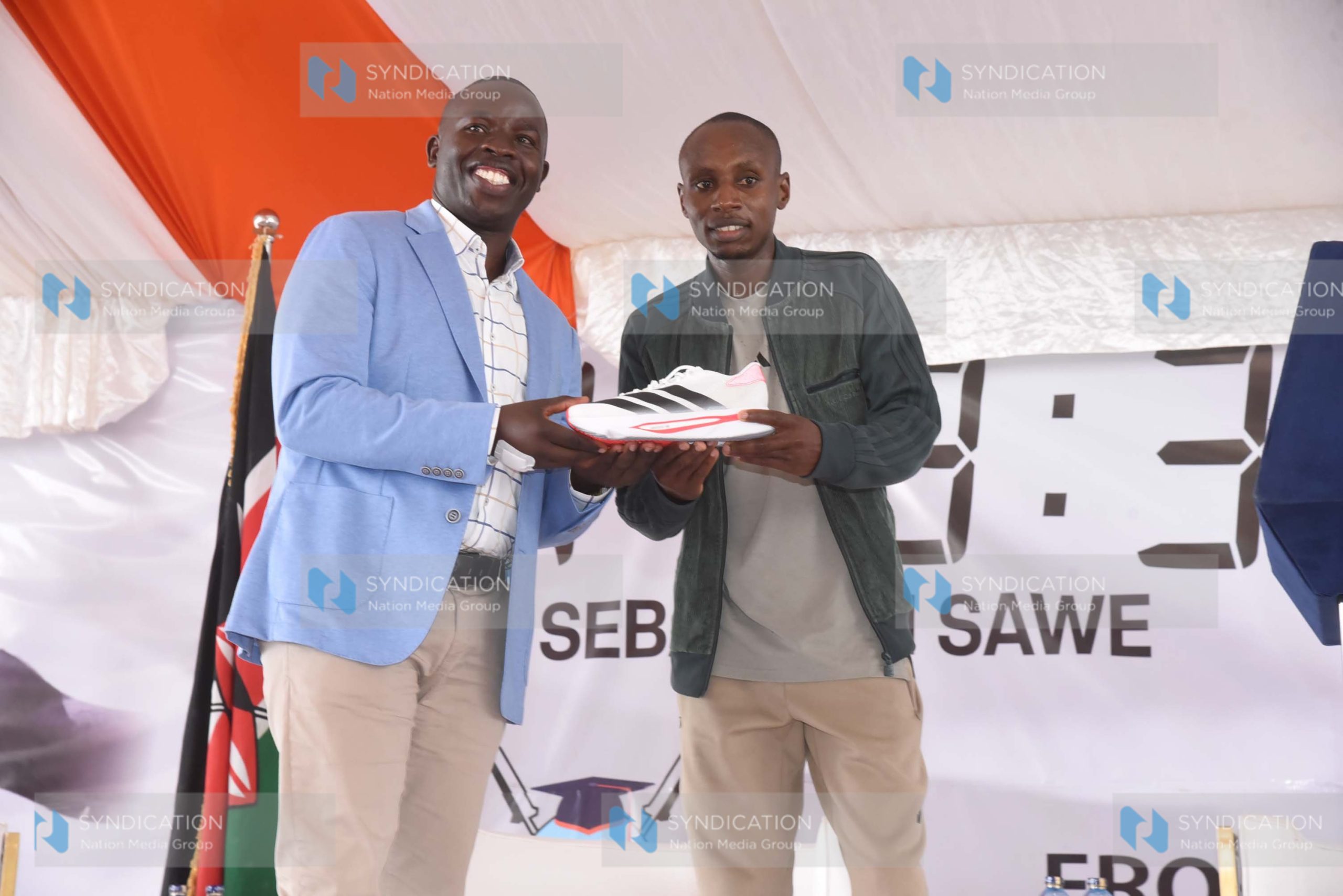 The new World Marathon Record Holder Sabastian Sawe with Nandi County Governor Stephen Sang