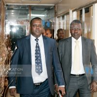 Sports Cabinet Secretary Dr Hassan Wario flanked by Principal Secretary Richard Ekai