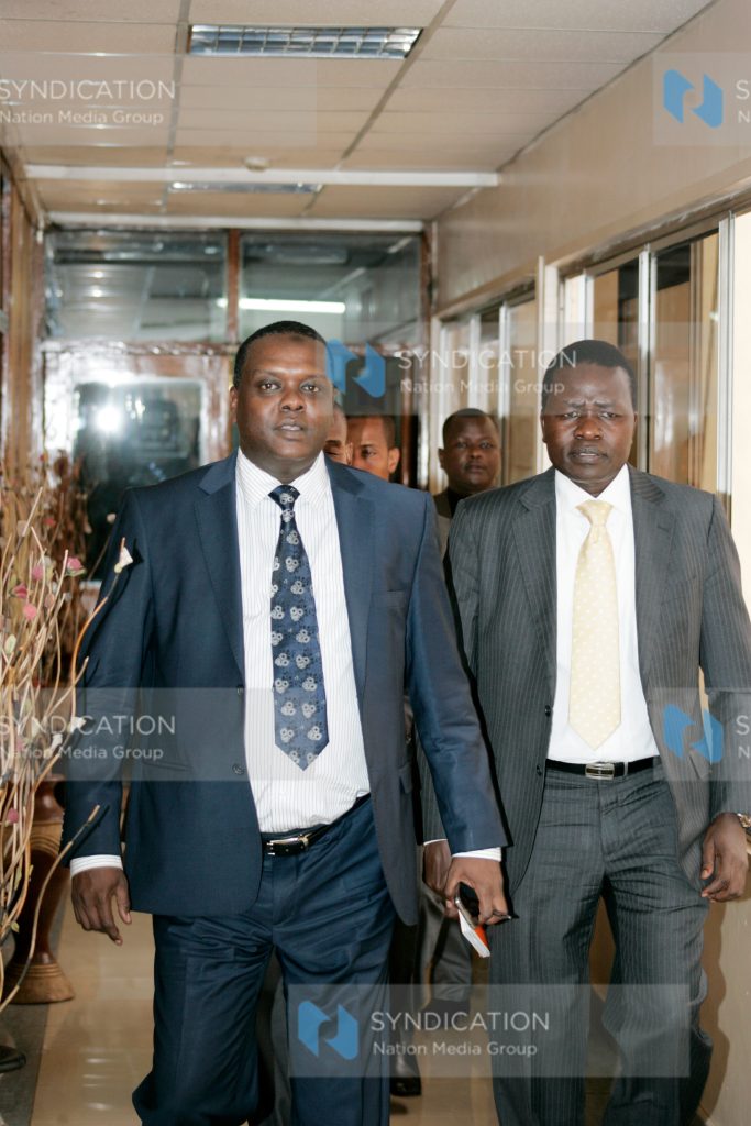 Sports Cabinet Secretary Dr Hassan Wario flanked by Principal Secretary Richard Ekai
