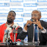 Sportpesa Chief Executive Officer Ronald Karauri with Kenya Rugby Union Shujaa Captain Nelson Oyoo
