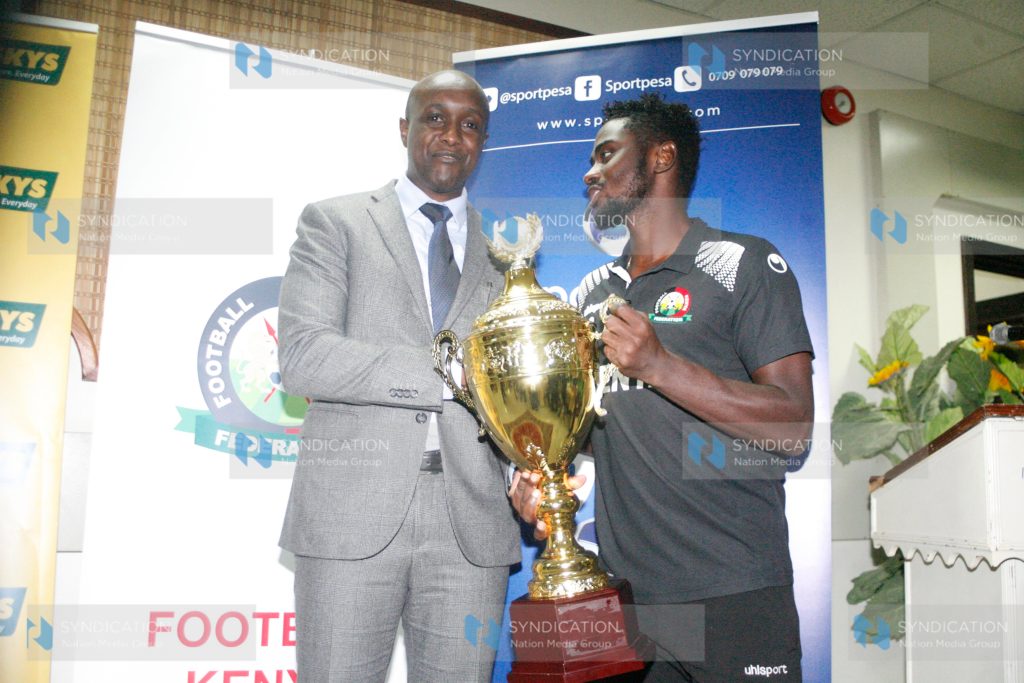 Sportpesa CEO Captain Ronald Karauri with Harambee Stars Captain Musa Mohammed