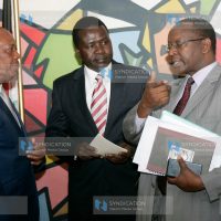 Sports Fund Board chairman Sam Njonde (left) with Sports Secretary Japter Rugut