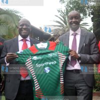 Sportpesa Ronald Karauri with Kenya Rugby Union chairman Richard Omwela
