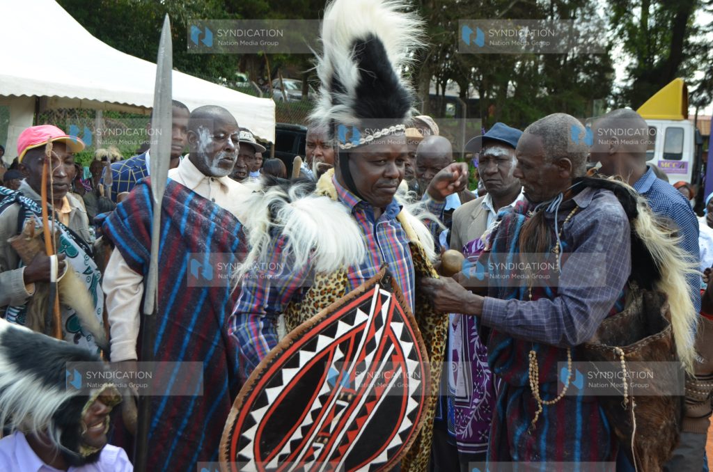 Embu Senator Lenny Kivuti (holding a spear) after he was installed as an Embu elder