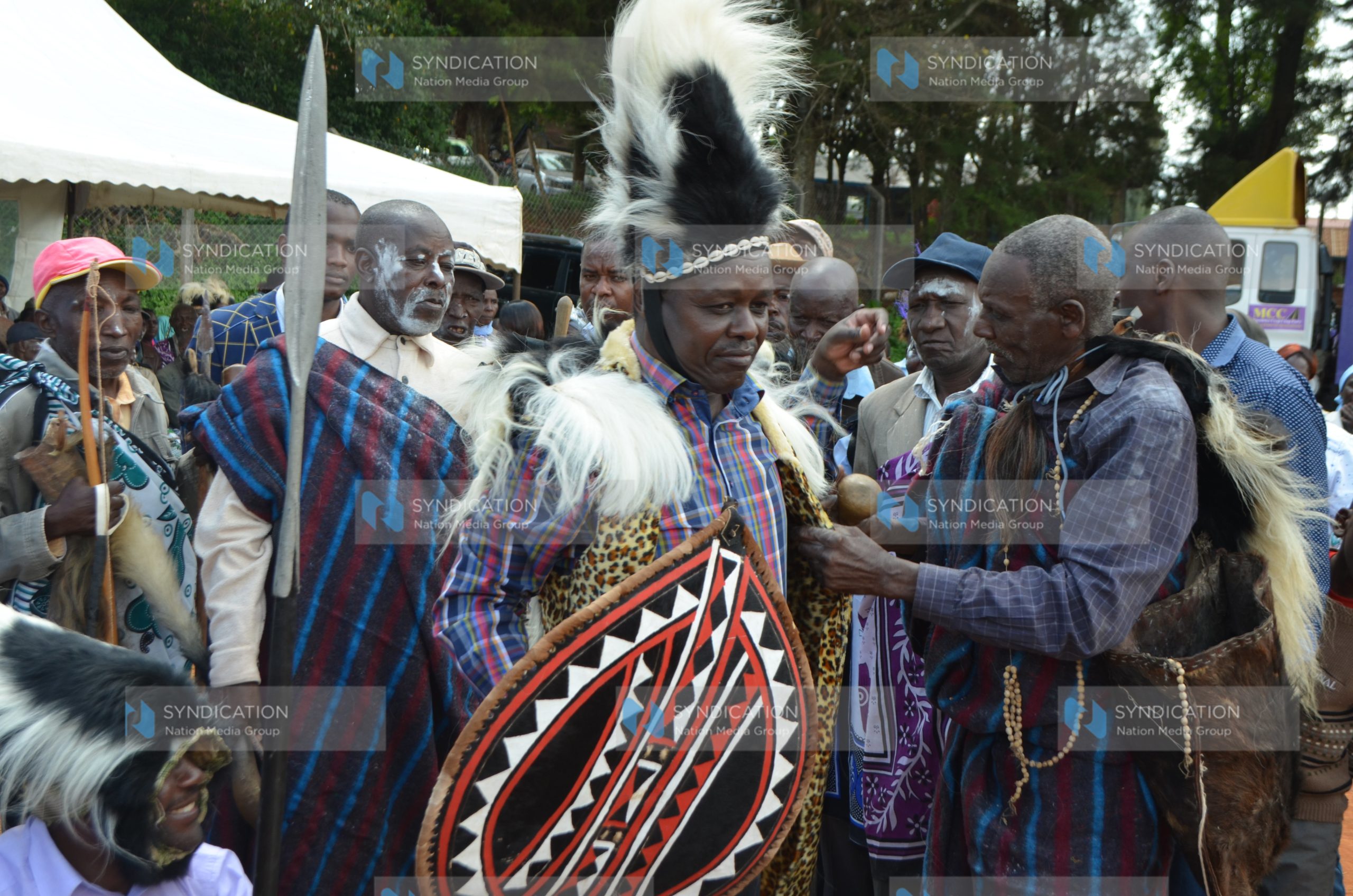Embu Senator Lenny Kivuti (holding a spear) after he was installed as an Embu elder