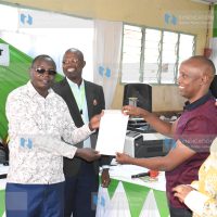 Isiolo Governor-elect Abdi Ibrahim Hassan Guyo (R) with his deputy James Lowasa display a certificate