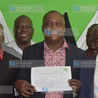 Cyrus Jirongo of the UDP displays his IEBC clearance certificate