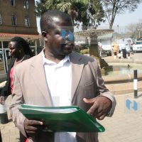 Activist Okiya Omtatah outside the Nairobi Law Courts