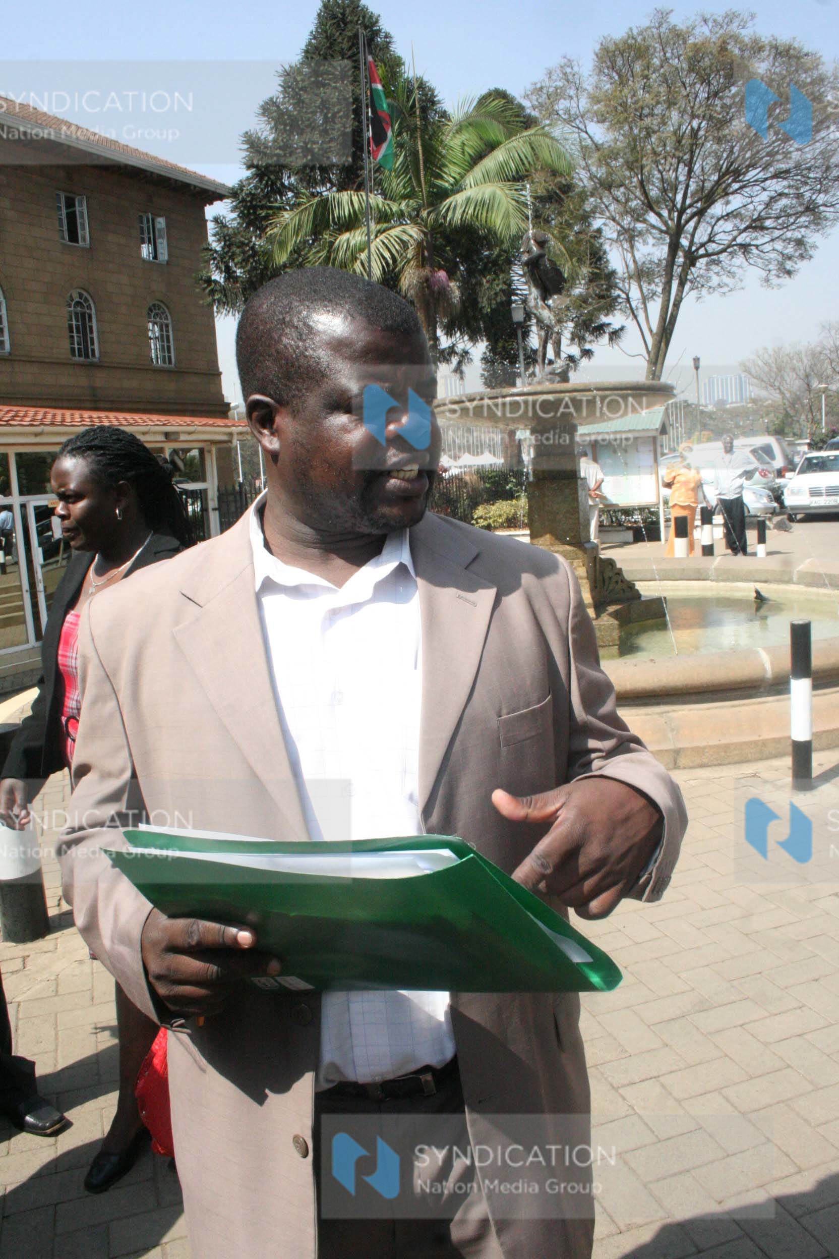 Activist Okiya Omtatah outside the Nairobi Law Courts