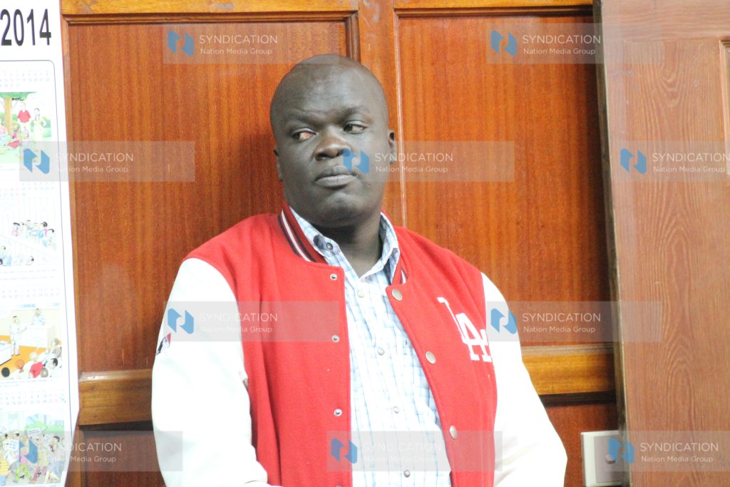Robert Alai Onyango in a Nairobi court yesterday during the hearing of a case
