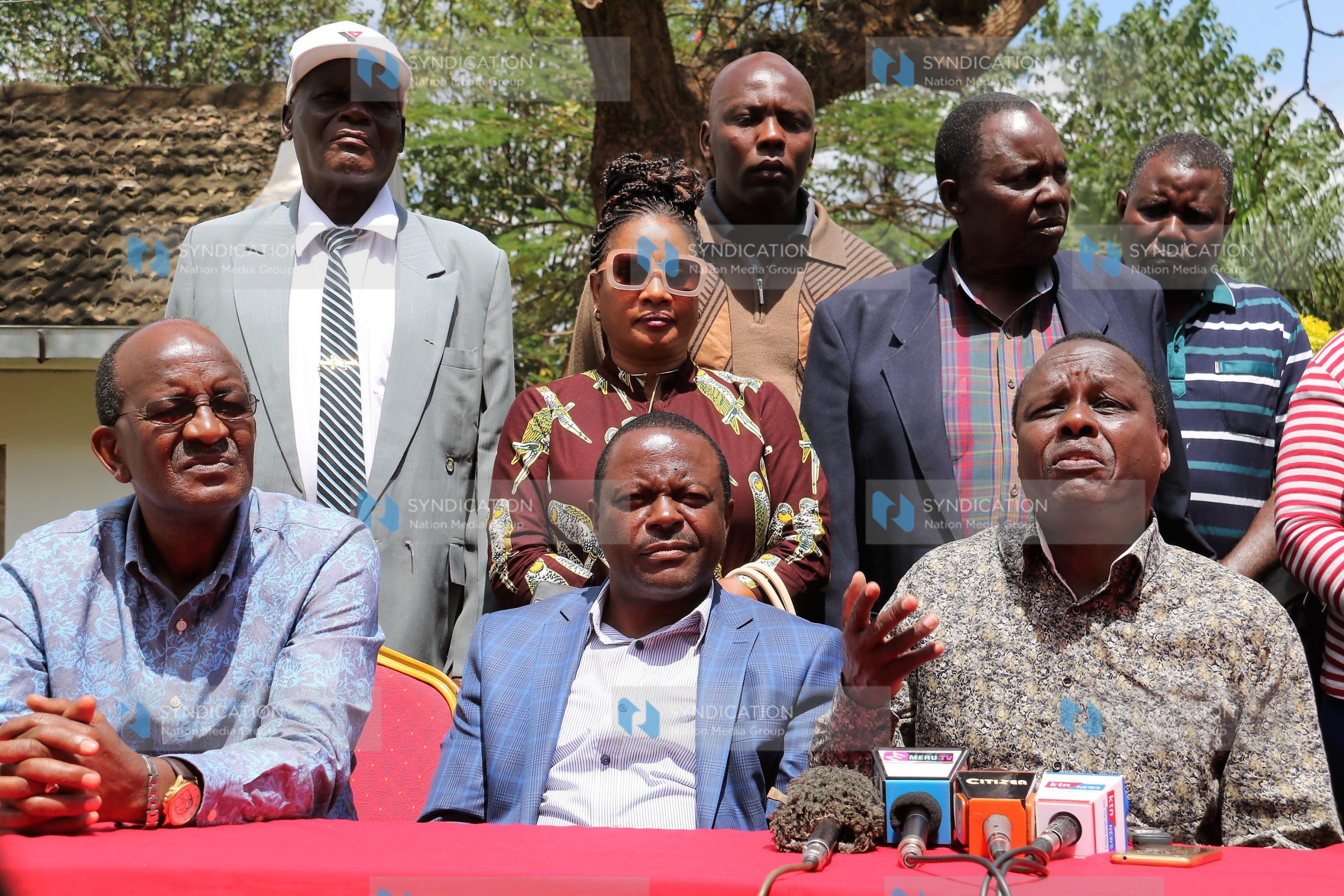 Former Embu Senator Lenny Kivuti (right) addresses the press