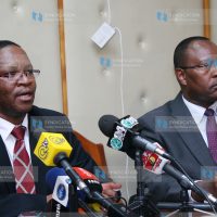 Principal secretary Karanja Kibicho (left) flanked by Political and diplomatic secretary Amb. Robert Ngesu addresses a media