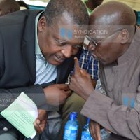 Kakamega Senator Boni Khalwale confers with United Democratic Party leader Cyrus Jirongo