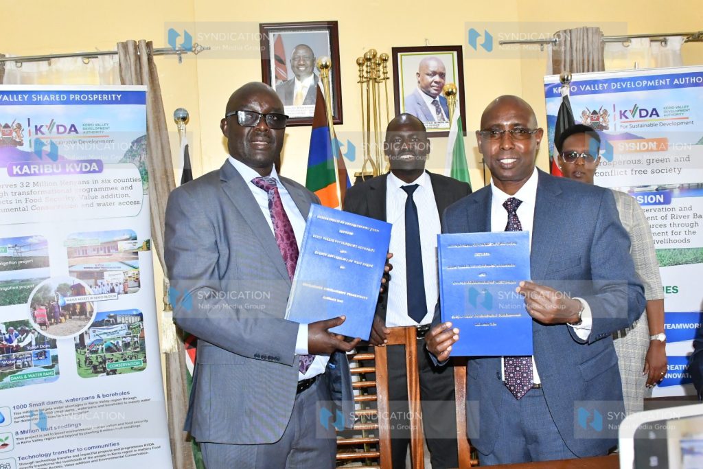 West Pokot Governor Simon Kachapin and KVDA managing Director Sammy Naporos