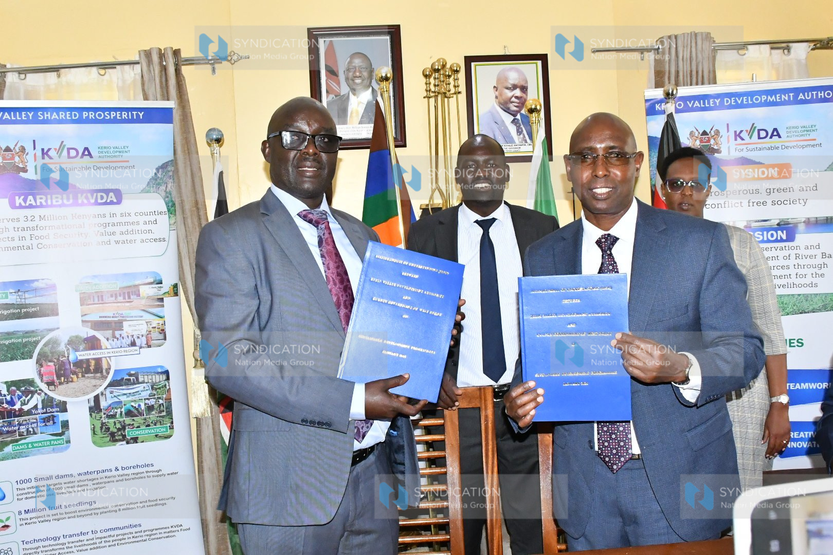 West Pokot Governor Simon Kachapin and KVDA managing Director Sammy Naporos