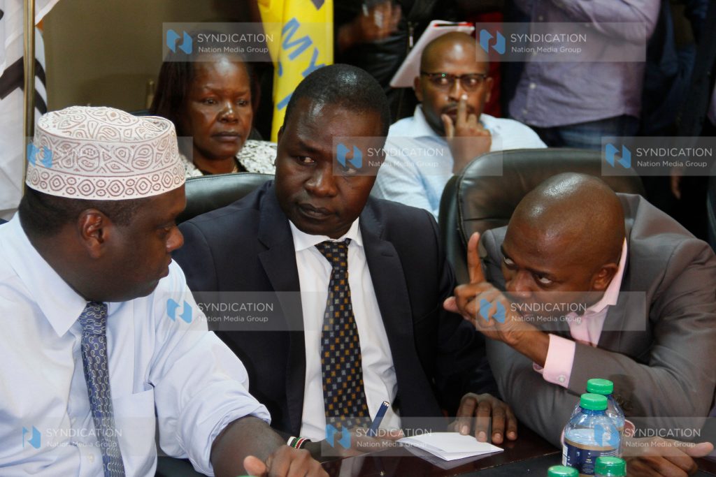 Sports Minister Hassan Wario, Principal secretary Richard Ekai and Nick Mwendwa FKF